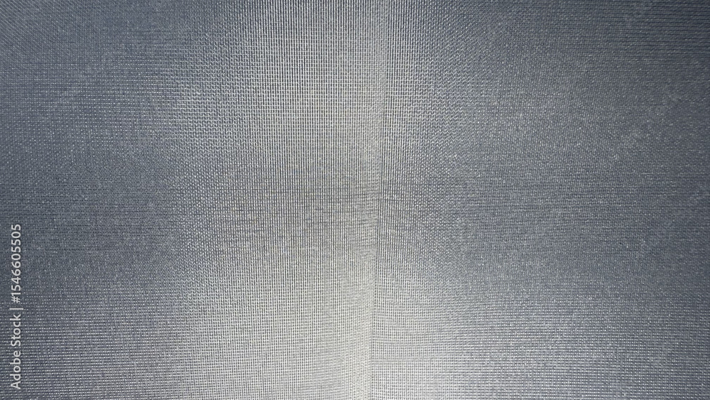 Poster close-up of silver gray textile with fine woven grid pattern and central seam, ideal for use in modern fabric texture background, branding, or packaging design

