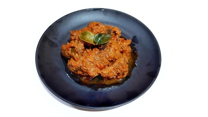 Beef Toppa Lada served in a black plate. Popular Indonesian food from Makassar, South Sulawesi