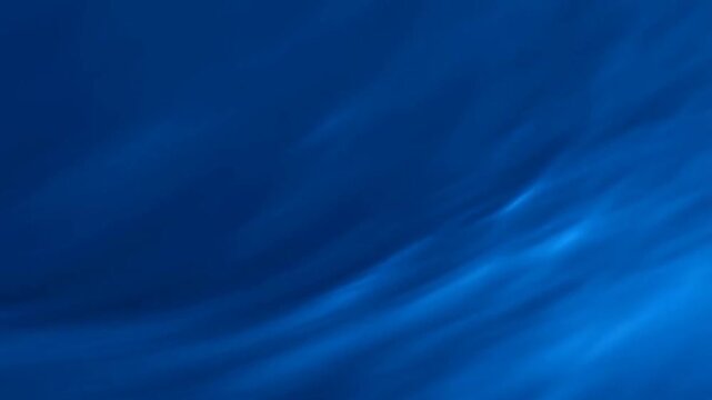 Loopable blue background with smooth gradients and subtle light movement, creating a calm and elegant seamless animation.
