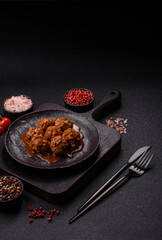 Meat, meatballs in tomato sauce, Italian food, beef or pork with salt . Meatballs with tomatoes