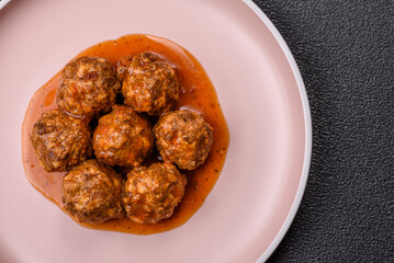 Meat, meatballs in tomato sauce, Italian food, beef or pork with salt . Meatballs with tomatoes