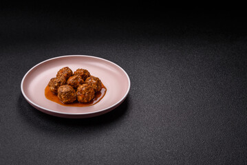 Meat, meatballs in tomato sauce, Italian food, beef or pork with salt . Meatballs with tomatoes