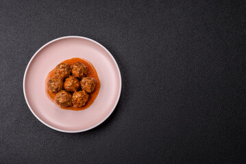 Meat, meatballs in tomato sauce, Italian food, beef or pork with salt . Meatballs with tomatoes