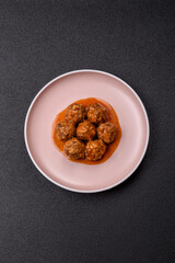 Meat, meatballs in tomato sauce, Italian food, beef or pork with salt . Meatballs with tomatoes