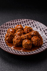 Meat, meatballs in tomato sauce, Italian food, beef or pork with salt . Meatballs with tomatoes