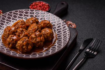 Meat, meatballs in tomato sauce, Italian food, beef or pork with salt . Meatballs with tomatoes
