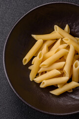 Penne pasta cooked with cheese, salt and spices. Italian food penne pasta