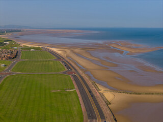 Aerial image of the New Brighton coast featuring the promenade and the Pierrot Statue at the...