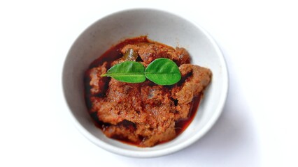 Beef Toppa Lada served in a white bowl. Popular Indonesian food from Makassar, South Sulawesi