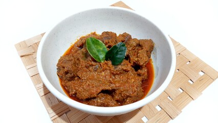 Beef Toppa Lada served in a white bowl. Popular Indonesian food from Makassar, South Sulawesi