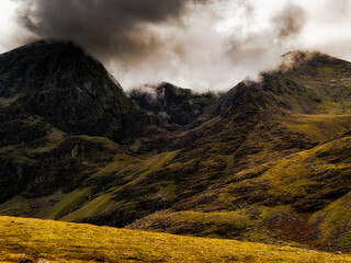Experiencing scenic hiking trails on Carrauntoohil walkway in County Kerry, Ireland.