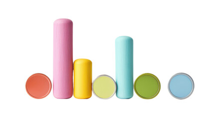 Obraz premium Colorful Cylindrical Objects and Circular Discs Arranged in a Playful Layout on a White Background
