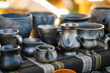 Ceramic dishes, tableware and jugs sold on Kaziuko muge or Kaziukas fair, traditional Easter market...