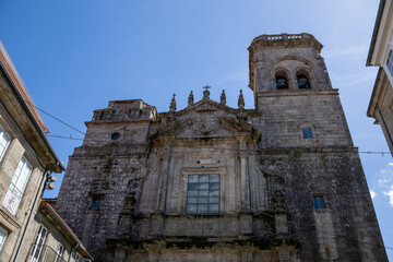 Jesuit Church of Saint Augustine in Santiago de Compostela, Galicia, Spain. Historic baroque architecture with stone facade and religious details.