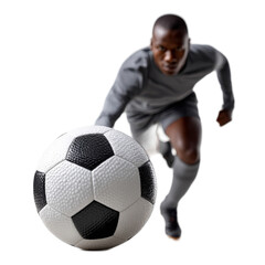 Dynamic soccer player in motion reaching for a ball during an intense game on the field, capturing the spirit of competition