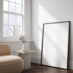 Cozy minimalist living room corner with a blank poster frame armchair and winter window view
