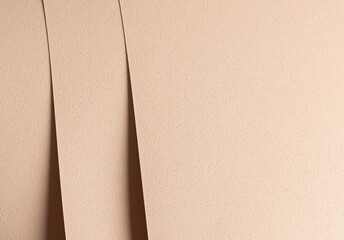 Elegant designer paper background. Beige and cream sheets with geometric overlap, punched edges,