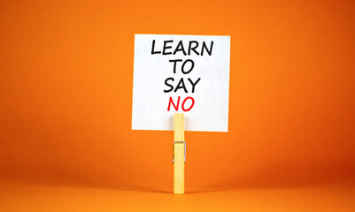 Learn to say no symbol. Concept words phrase Learn to say no on beautiful white paper on wooden...