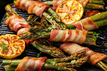 Grilled Bacon Wrapped Asparagus in iron cast pan