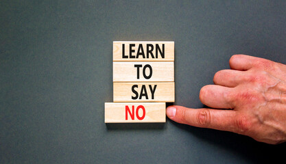 Learn to say no symbol. Concept words phrase Learn to say no on beautiful wooden blocks. Beautiful...