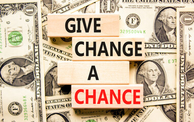 Give change a chance symbol. Concept words phrase Give change a chance on beautiful wooden blocks....