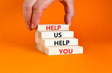 Help you symbol. Concept words phrase Help us help you on beautiful wooden blocks. Beautiful orange...