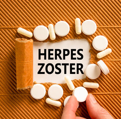 Herpes zoster symbol. Concept words Herpes zoster on beautiful white paper. White pills tablets....