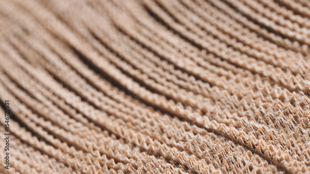 Poster A long brown strip of thin sheets of kraft paper with line pattern. texture is rough and the lines are close together, creating a sense of depth and volume. scene is one of warmth