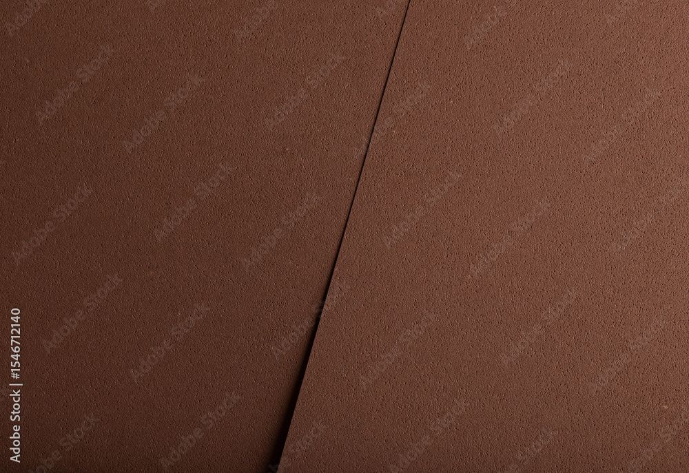 Poster luxury background with overlapping sheets of designer paper in chocolate brown tones. pitted porous