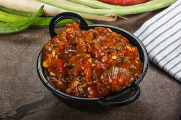 Manchurian chicken with sauce and spices