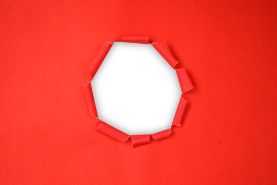 Torn red paper with a circular hole, revealing a transparent background - Powered by Adobe