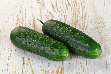 Ripe green raw two cucumbers