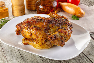Baked in oven whole chicken with spices