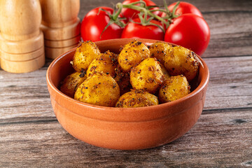 Baked small baby potato with herbs