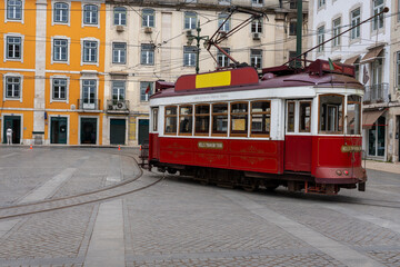 Vintage Red Tram in Lisbon Square Description
