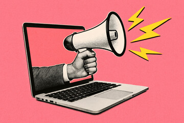 Laptop with Black-and-White Hand Holding Megaphone and Yellow Lightning Bolts &ndash; Digital Marketing Concept