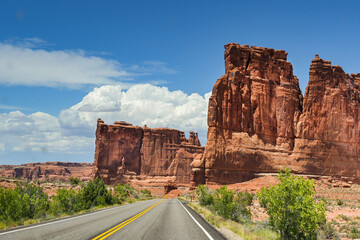 Road through spectacular landscape scenery in the Arches National Park in Moab. No people. Travel concept.