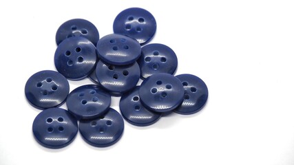 Colorful Sewing Buttons on White Background