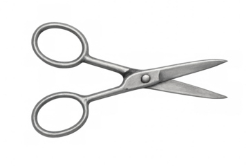 Close-up of slightly open vintage metal scissors, isolated on a transparent background, ready for precise cutting