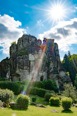Externsteine with Sunlight and Forest Garden