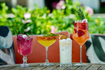 A Selection of Colorful Cocktails on an outside patio.