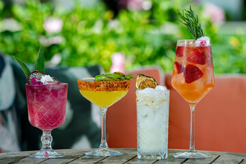 A Selection of Colorful Cocktails on an outside patio.