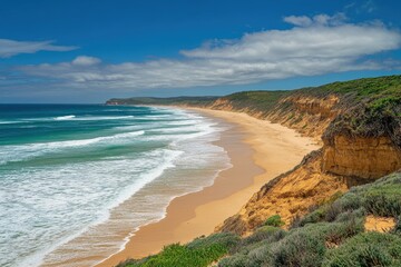 Aerial view of Guvvos beach showcasing clear waters and sandy shoreline in Victoria Australia, Guvvos beach aerial seascape Victoria Australia Great Ocean Road travel site