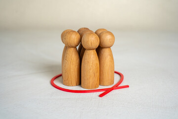 The group of people figures is outlined with a red line. Stay in the comfort zone and do not leave...