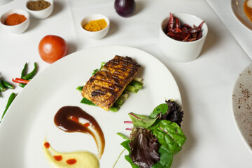 Grilled Paneer Steak with Sauces and Mixed Greens