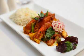 Delicious Spicy Shrimp Curry with Rice and Garnish