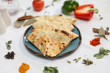 Delicious Indian Naan Bread with Spices and Vegetables