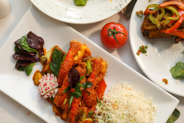 Delicious Indian Prawn Curry with Rice and Garnish