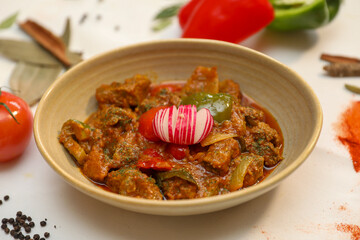 Delicious Indian Lamb Curry in a Bowl with Spices