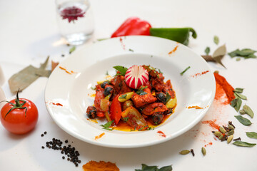 Delicious Chicken Tikka Masala Dish with Fresh Vegetables and Spices